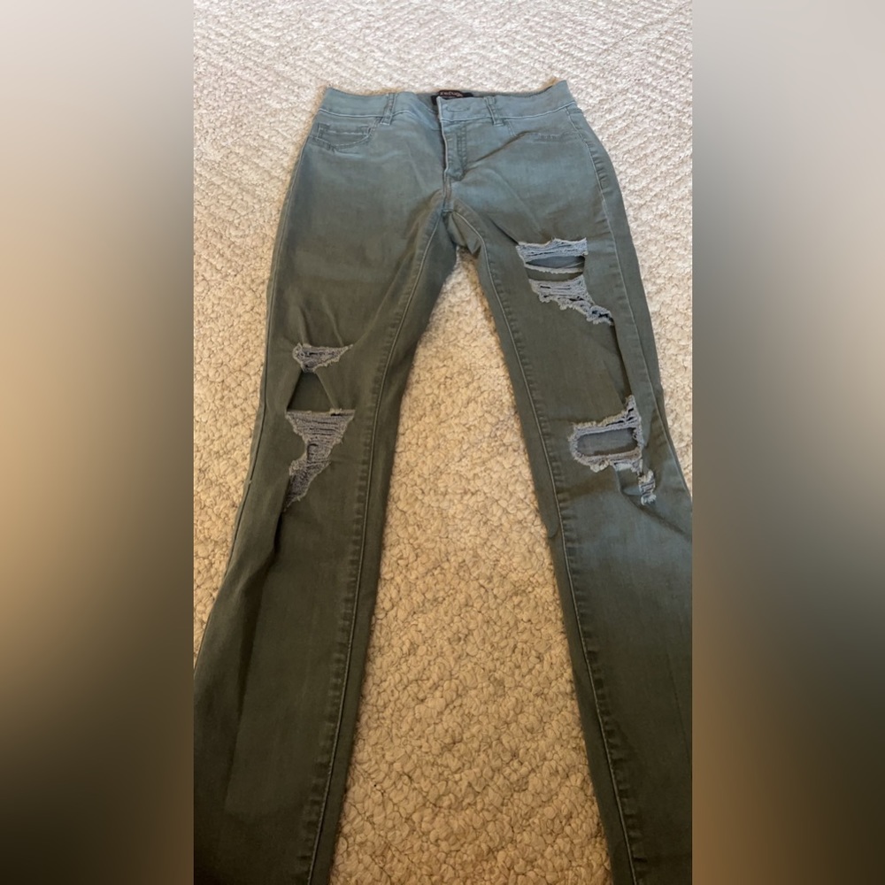 Green ripped skinny jeans